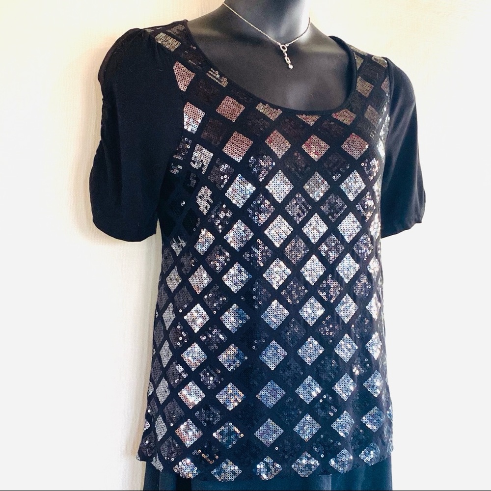 Dressy black top.